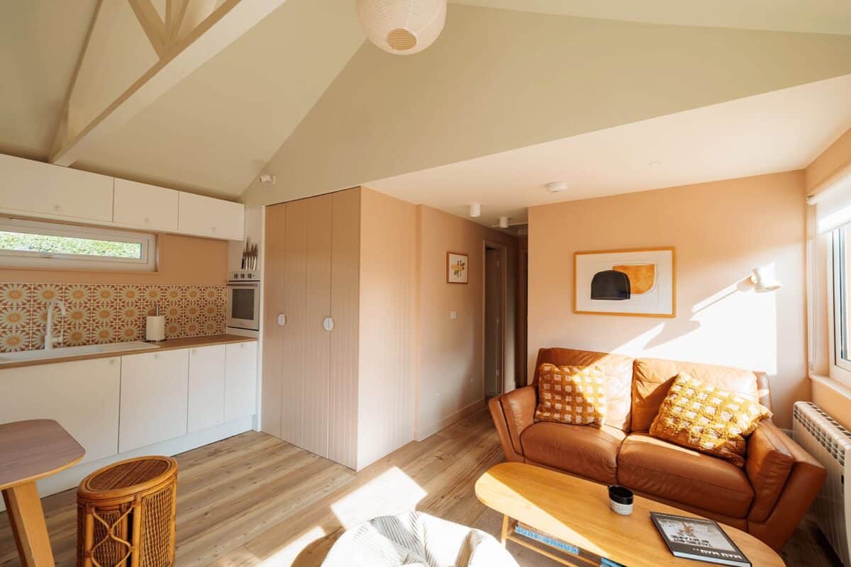 The open plan living space and kitchen at The Watershed by Croyde Beach in Devon