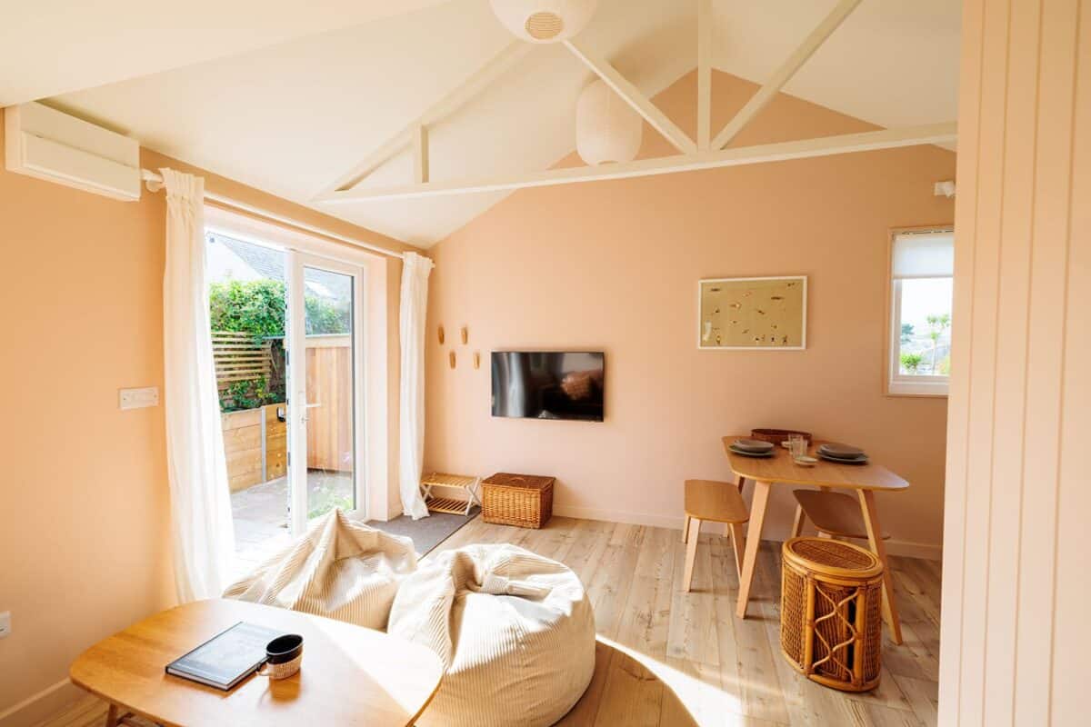 The dining area leads out to the terrace at The Watershed by Croyde Beach in Devon